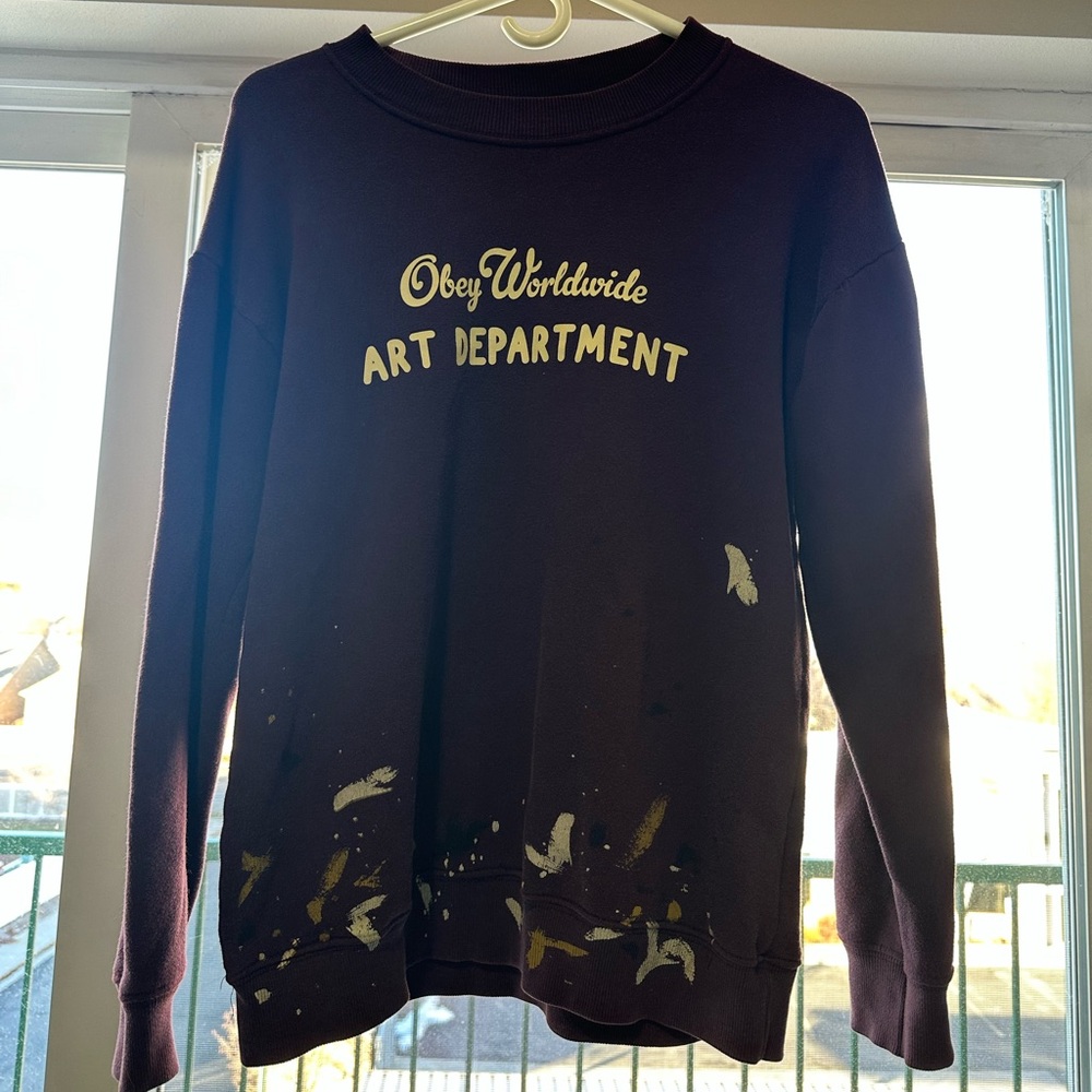 Dark burgundy Obey worldwide art department. Medium.
